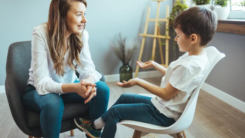 Young Boy Having Therapy With A Child Psychologist
