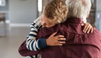 Attached Child Hugging His Grandfather