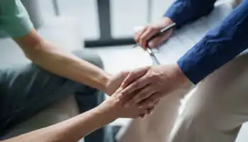 Professional Psychotherapy Taking Note During Appointment