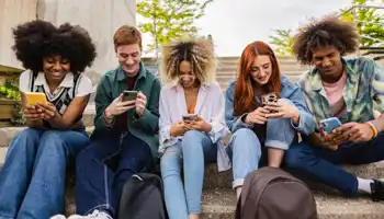 Group Of Young People Addicted To Social Networks