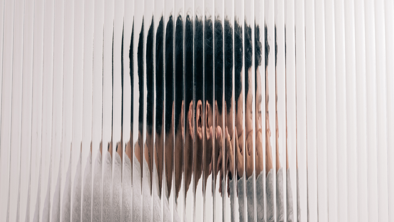 Man Behind A Glass